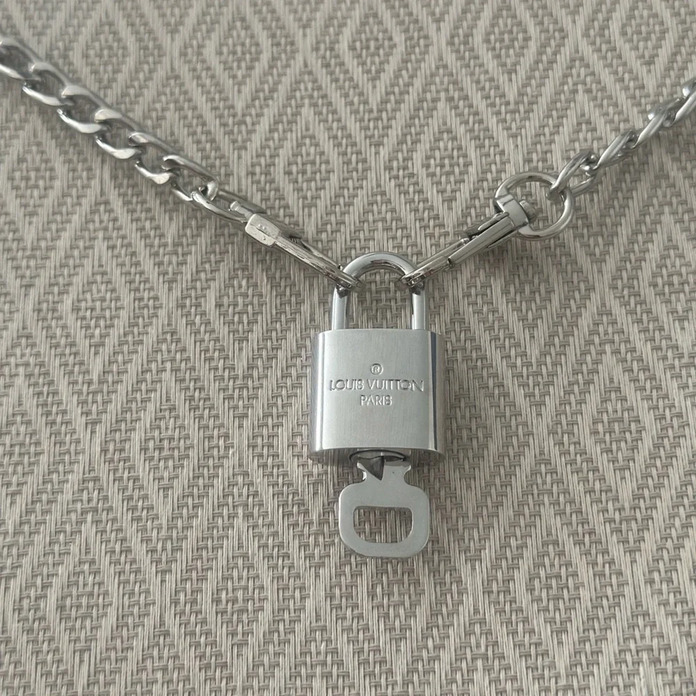 Louis Vuitton Silver Padlock w/ key & 27” Chain   to be worn as necklace